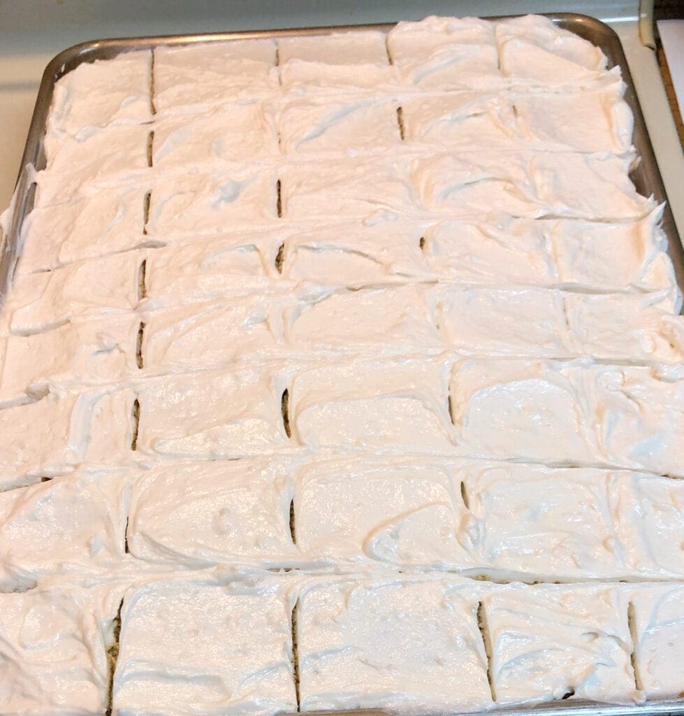 Slicing the Sheet Pan White Cake