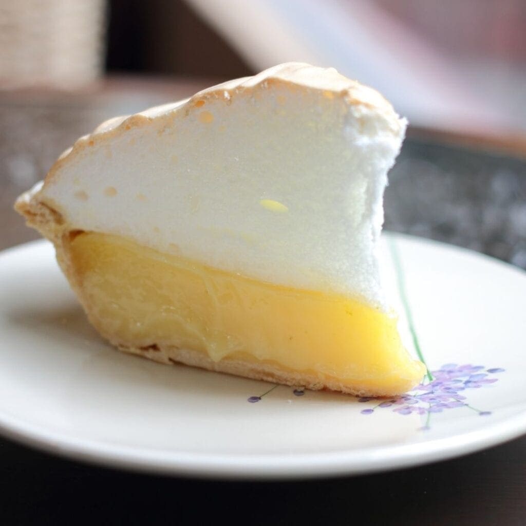 Slice of Lemon Custard Topped with Meringue Topping