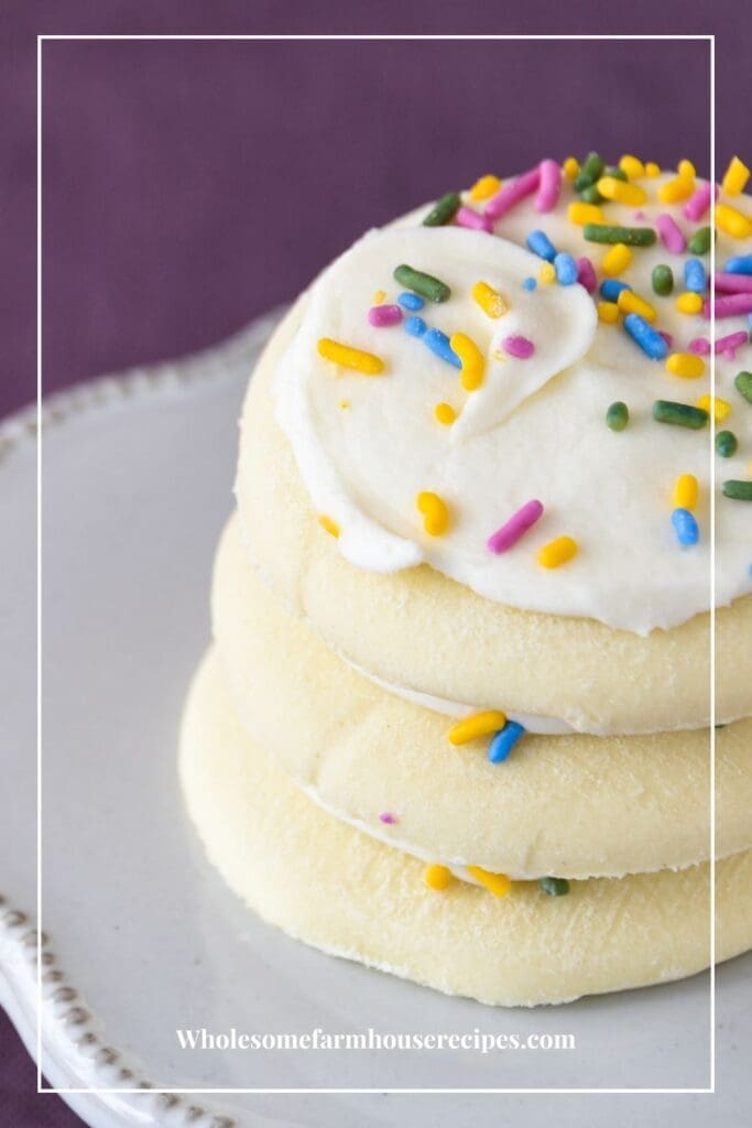 Stack of frosted cream cheese cookies