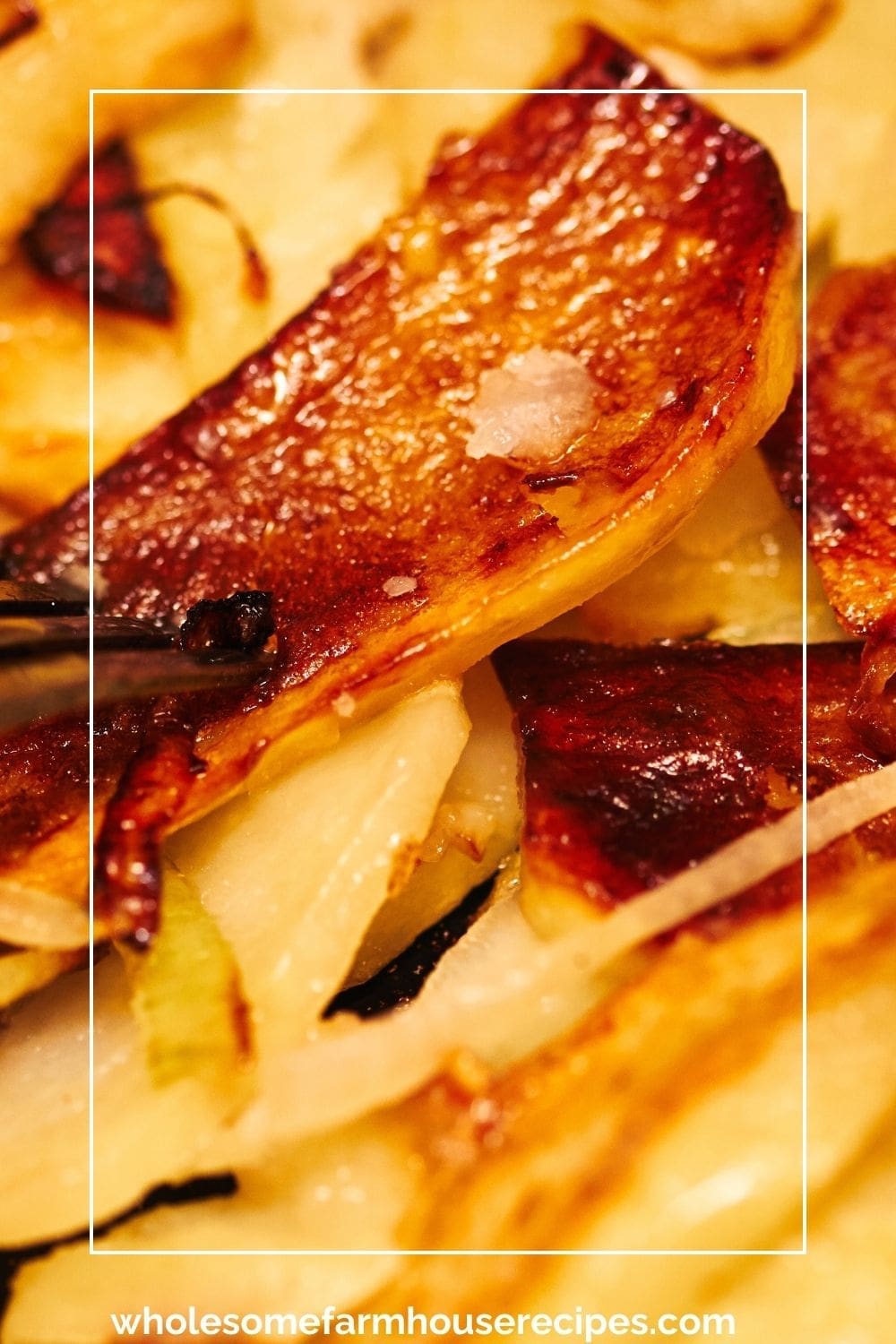 close up of potatoes and onions frying in skillet