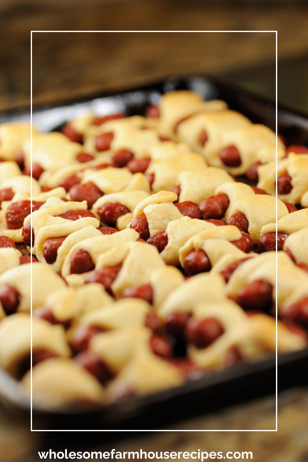 Mini Pigs in a Blanket on a Baking Sheet