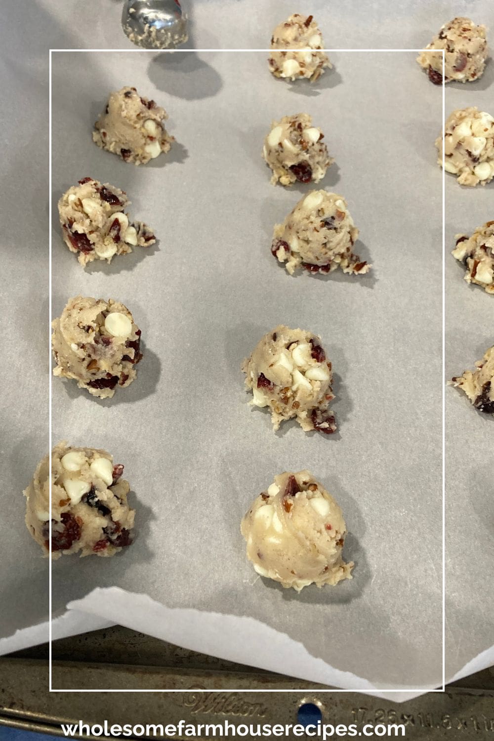 Cheesecake Chip Cranberry Pecan Cookie Balls on Baking Sheet