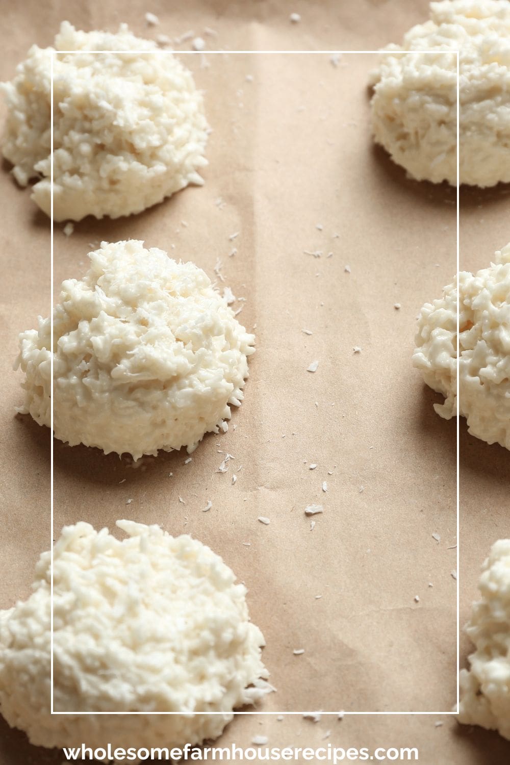 Coconut Macaroons on parchment paper ready for baking