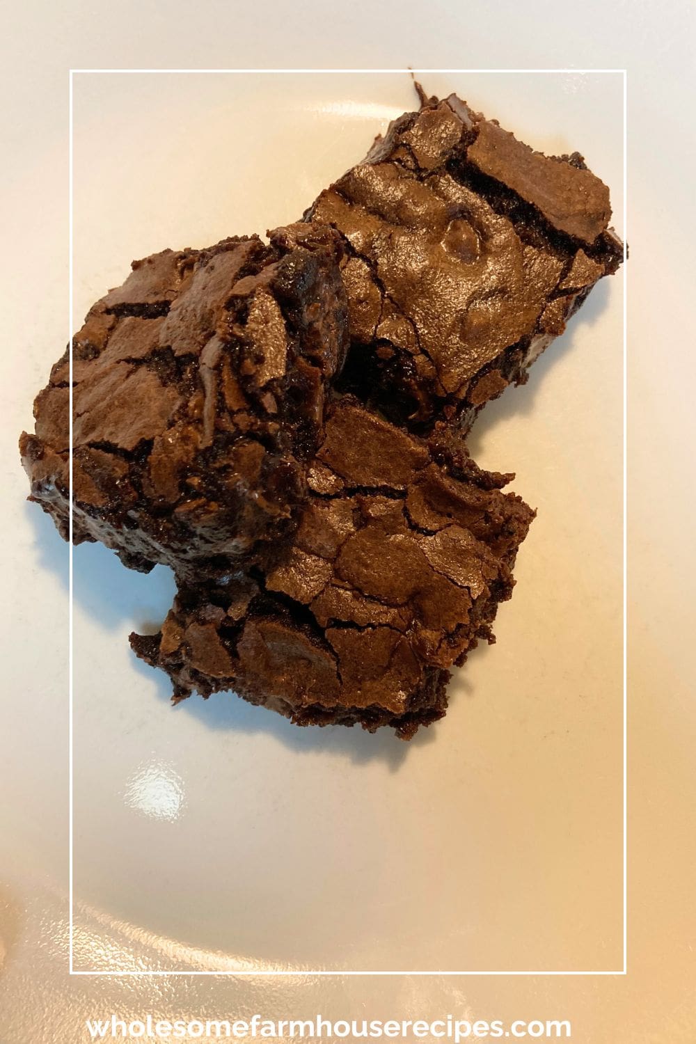 Super Fudgy Amaretto Flavored Brownies on a Plate