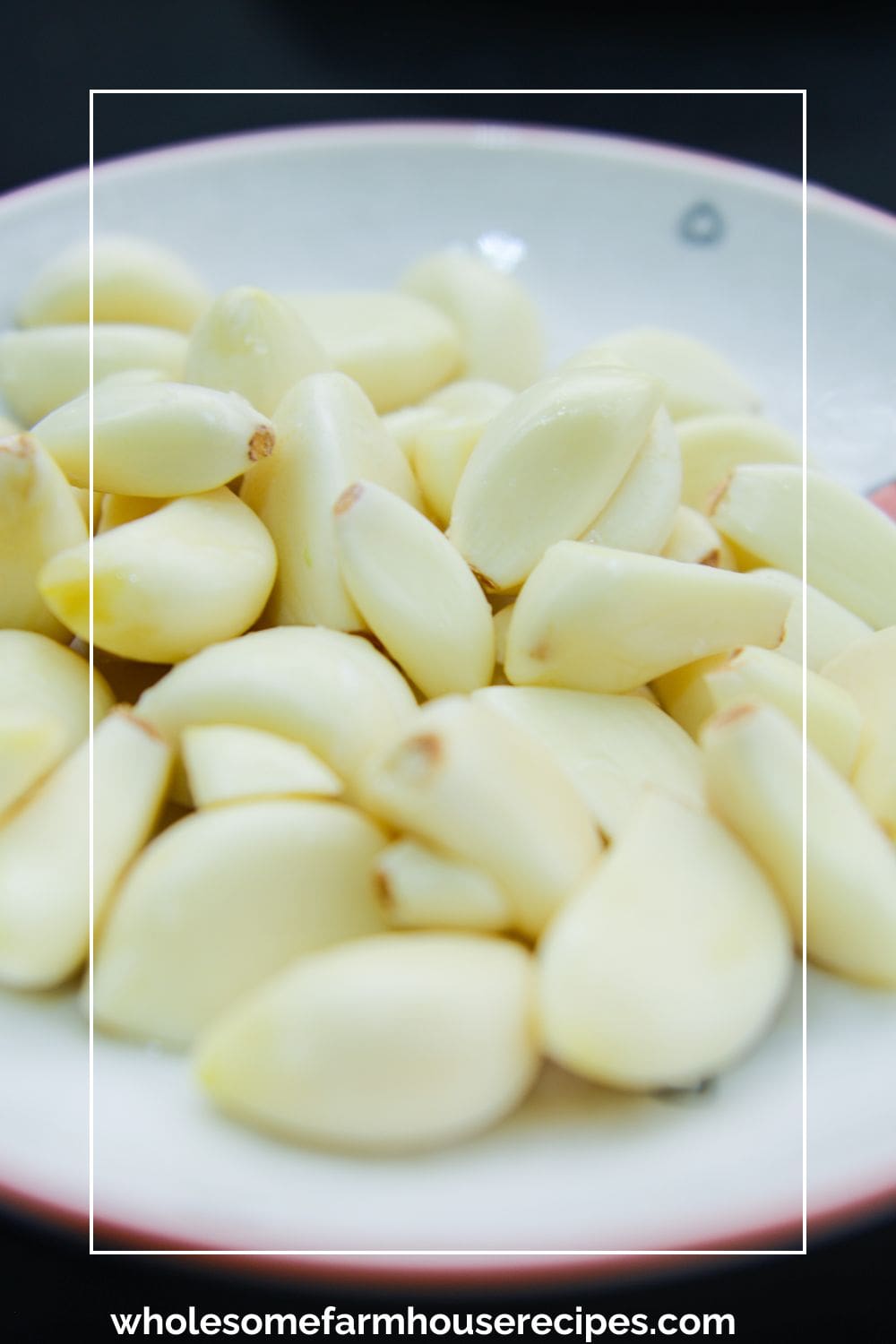 plate of peeled white garlic