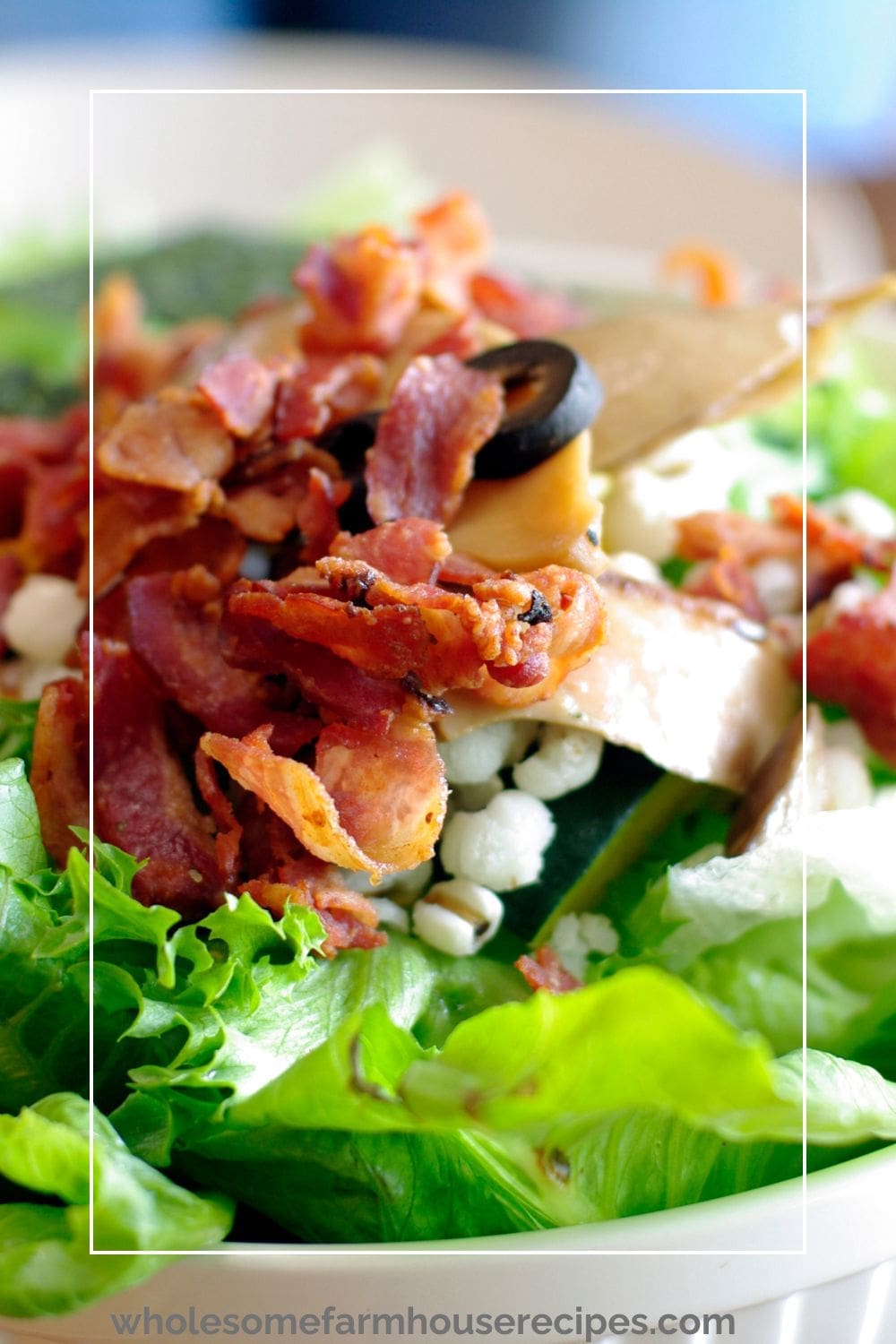 salad topped with crisp bacon