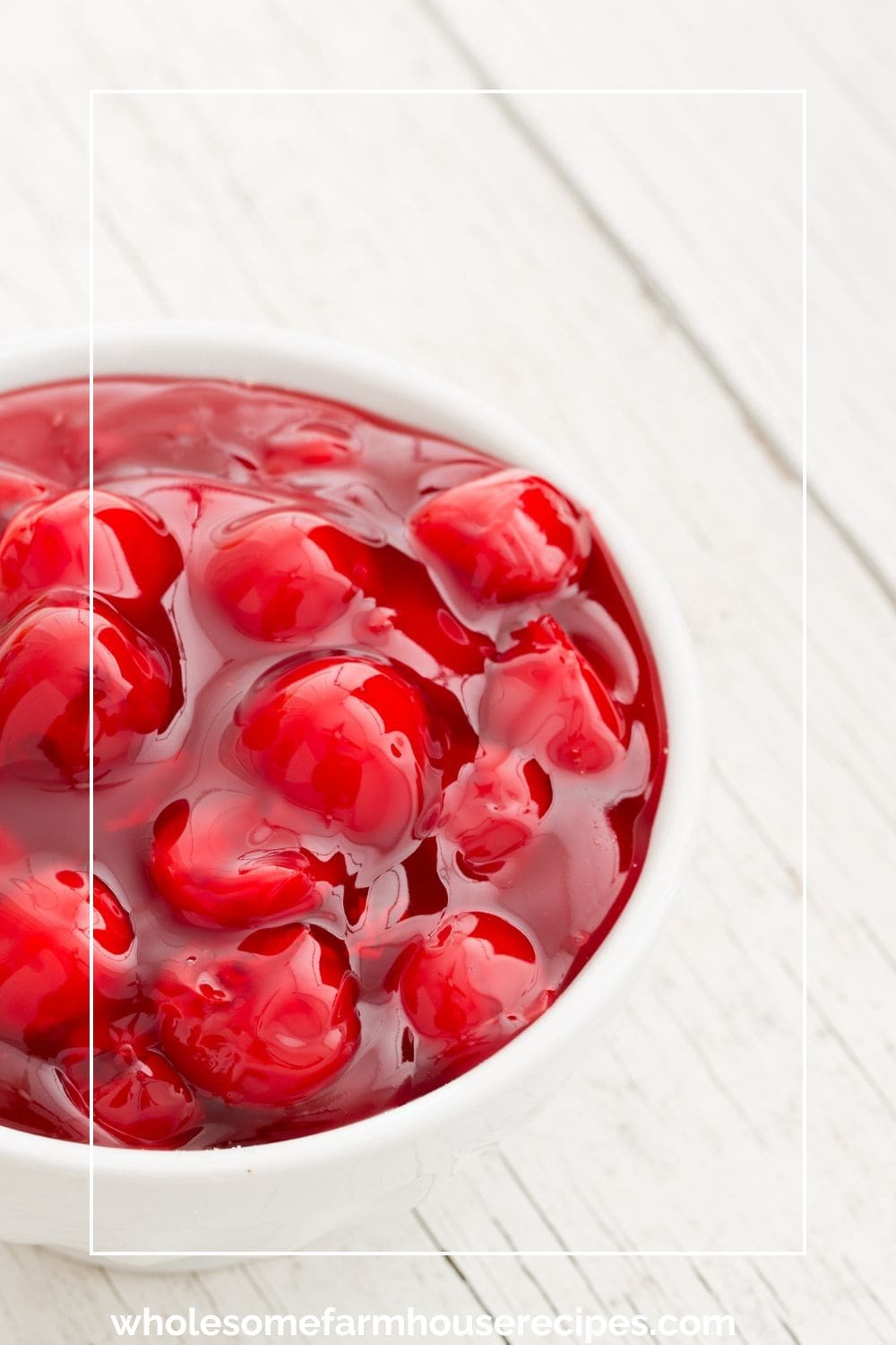 bowl of fresh made cherry pie filling with bing cherries