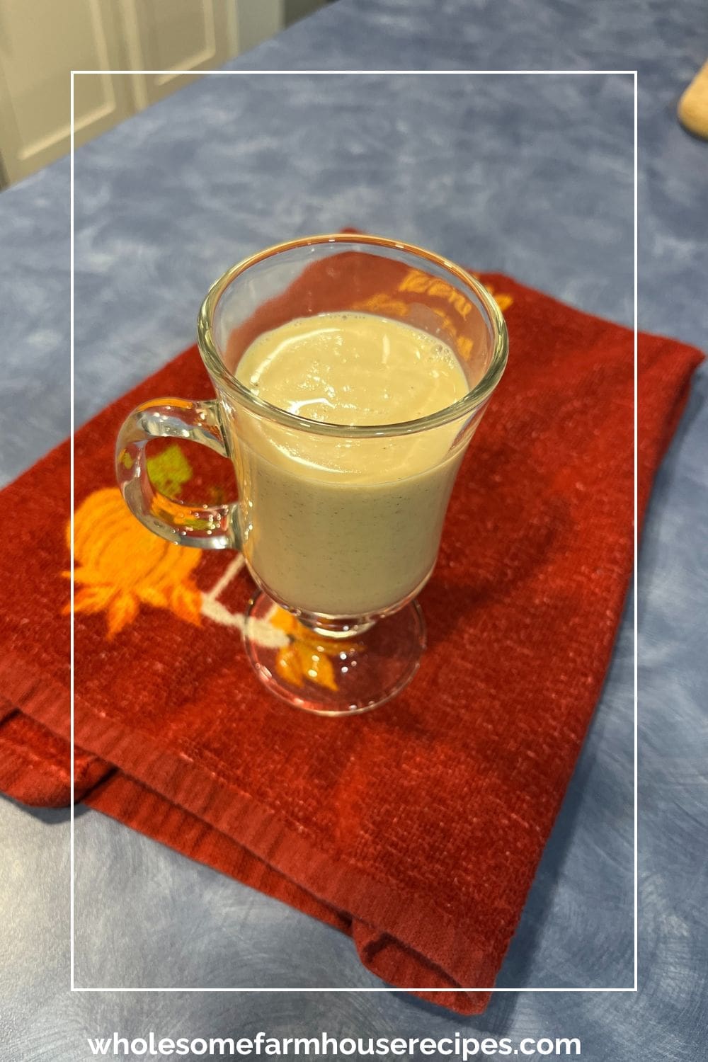 serving eggnog at the holidays in fancy cup