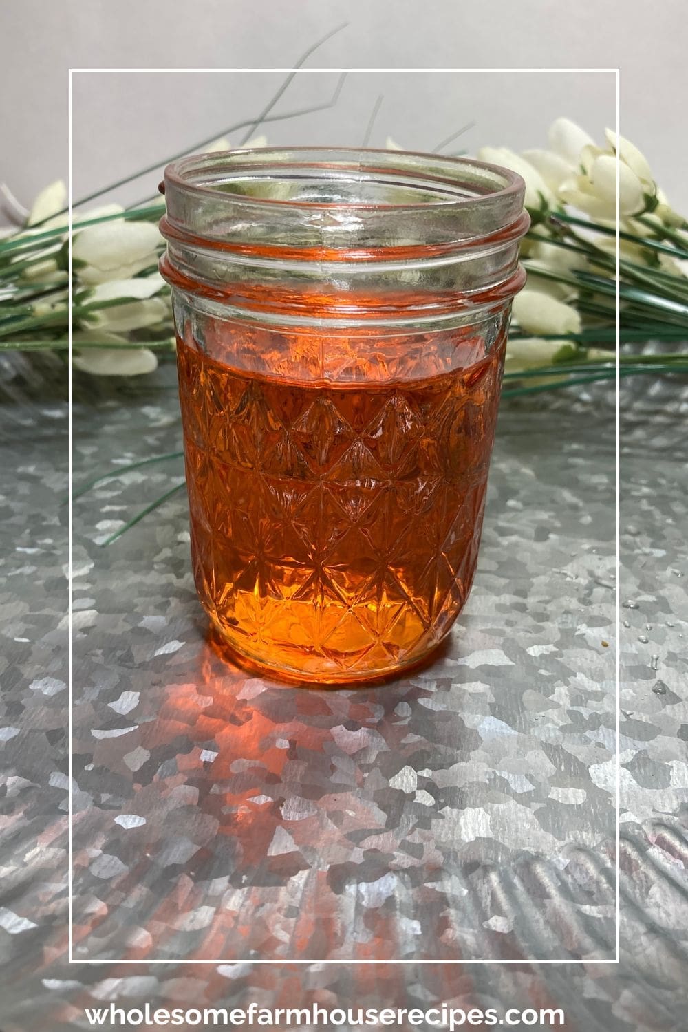 jar of peach sugar syrup