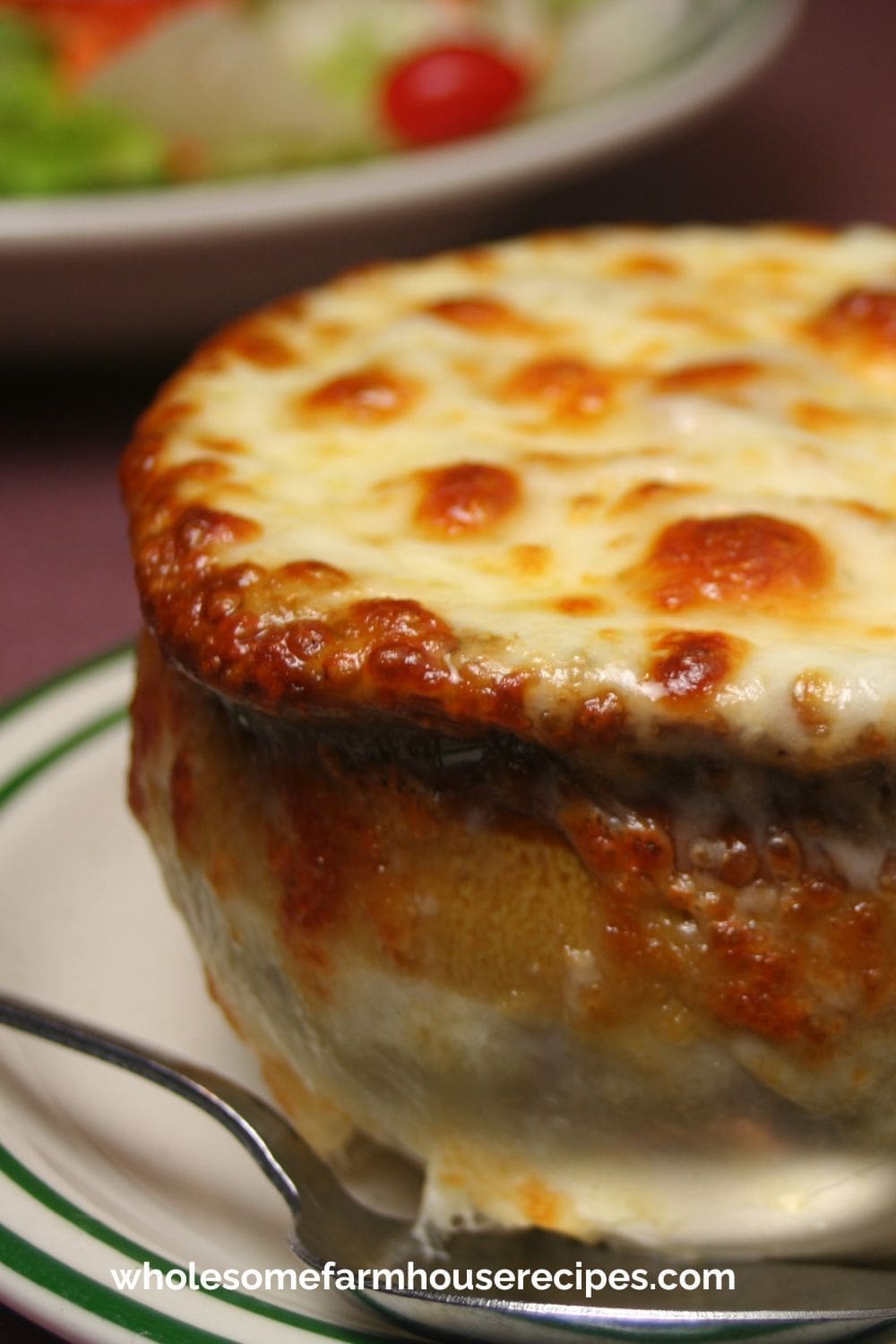 Bowl of Homemade French Onion Soup with Melted Cheese