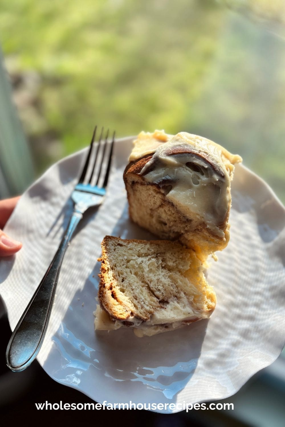 Close up of Cinnamon Roll with Cream Cheese Frosting