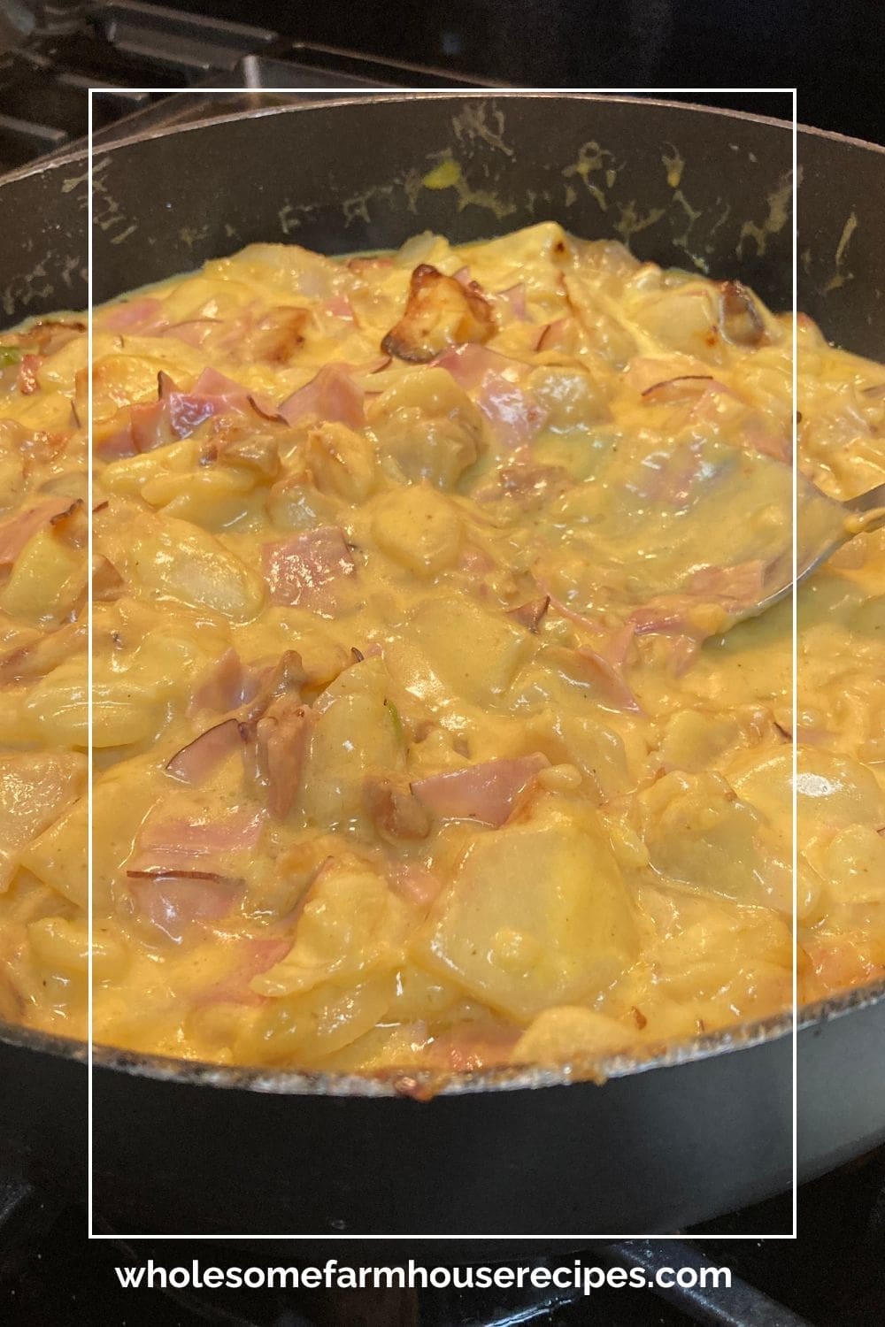 Skillet of Cheesy Ham and Potatoes